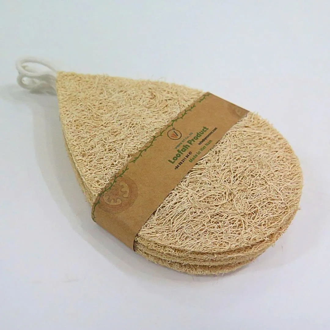 Stack of teardrop shaped natural loofah dish sponges with a kraft paper band
